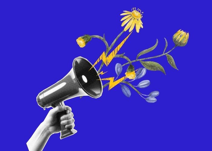 Eine Megaphon aus dem Blitze und Blumen kommen
